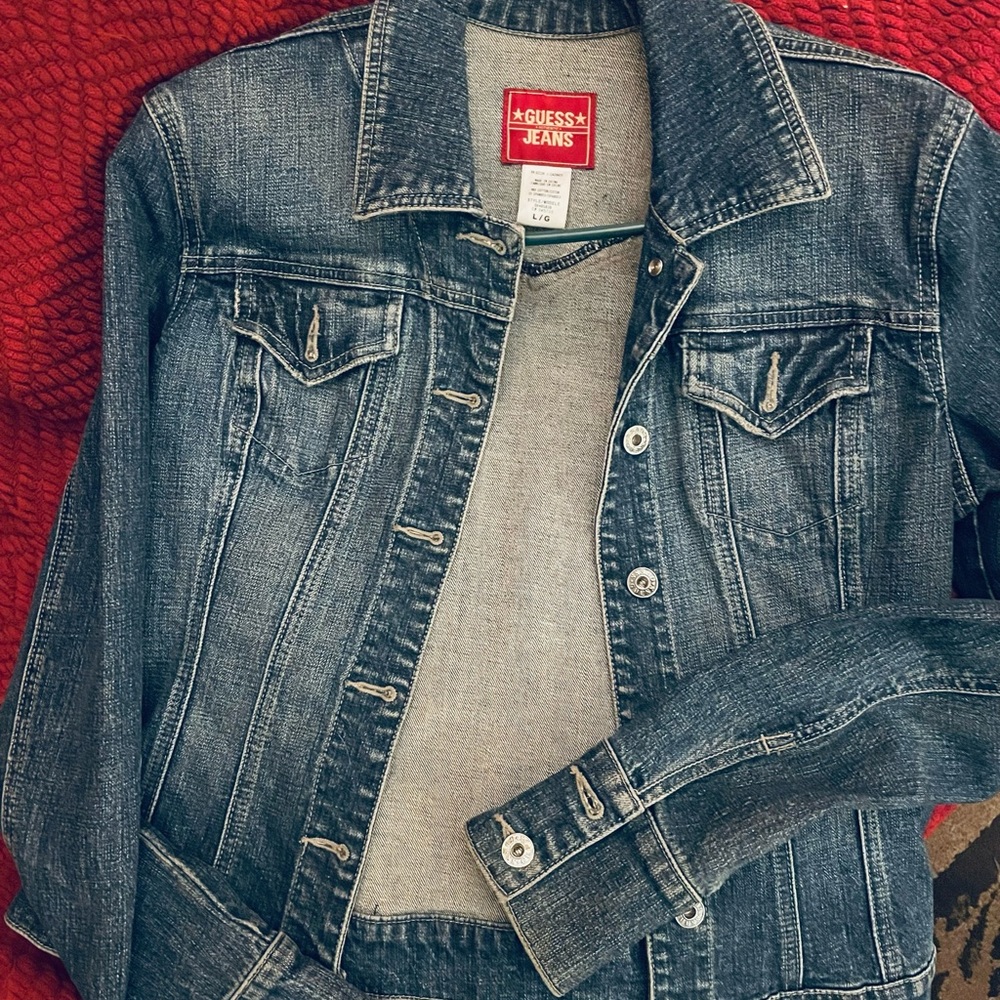 Nice fitting Guess denim jacket.  Great for spring or summer nights!!!
